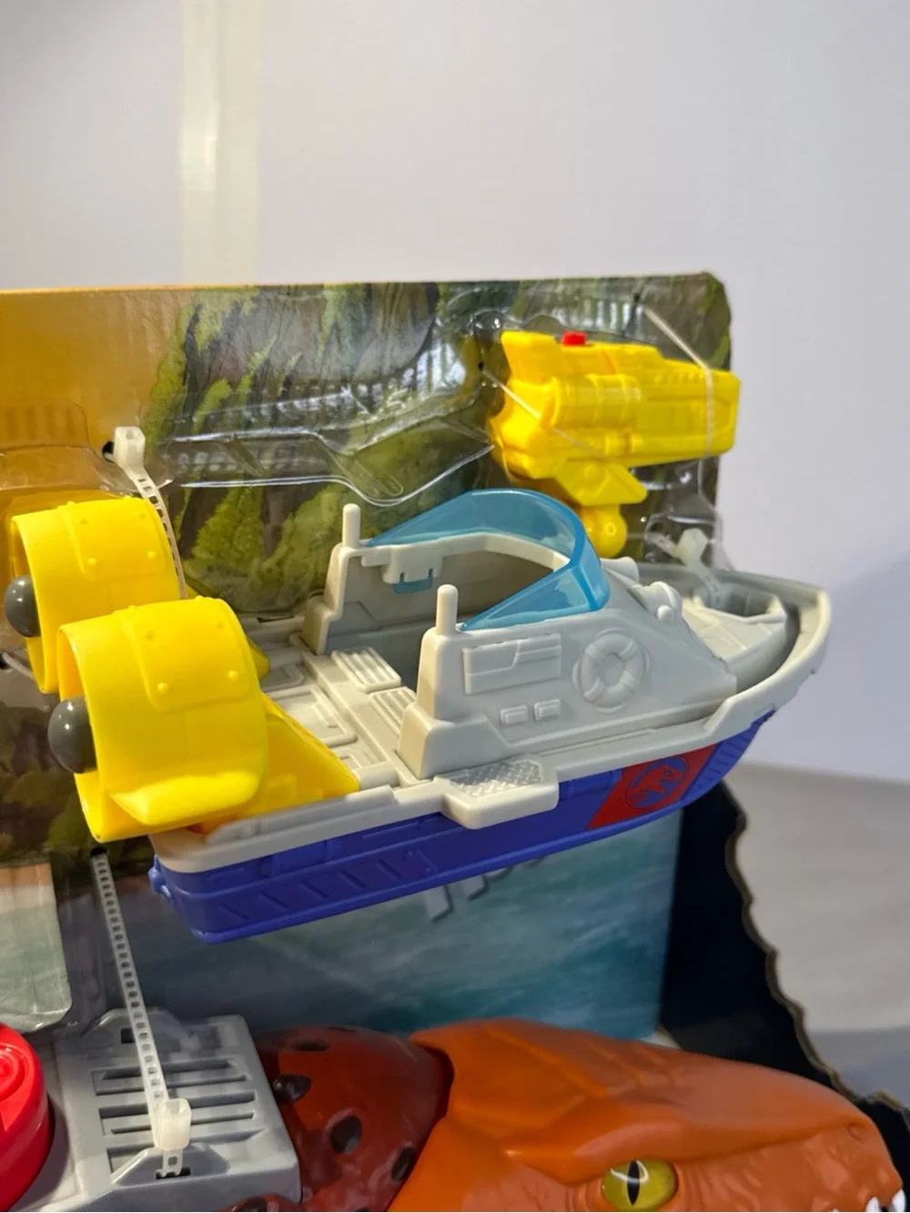 Fisher-Price Jurassic World Orange Dino Transport with Blue & Yellow Rescue Boat